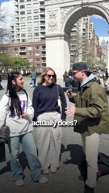 A Not Your Dad's Media street interview being filmed with a participant on a city sidewalk